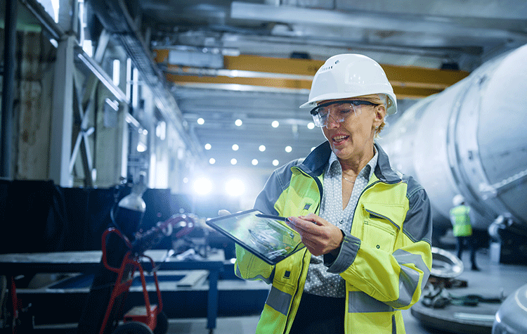 Site manager goes through the plans.
